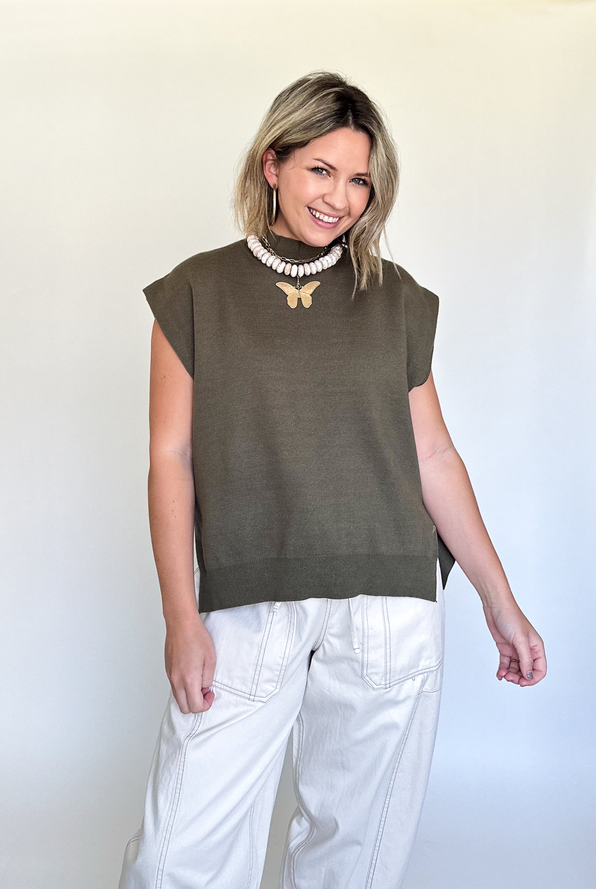 entro high neck sleeveless sweagter