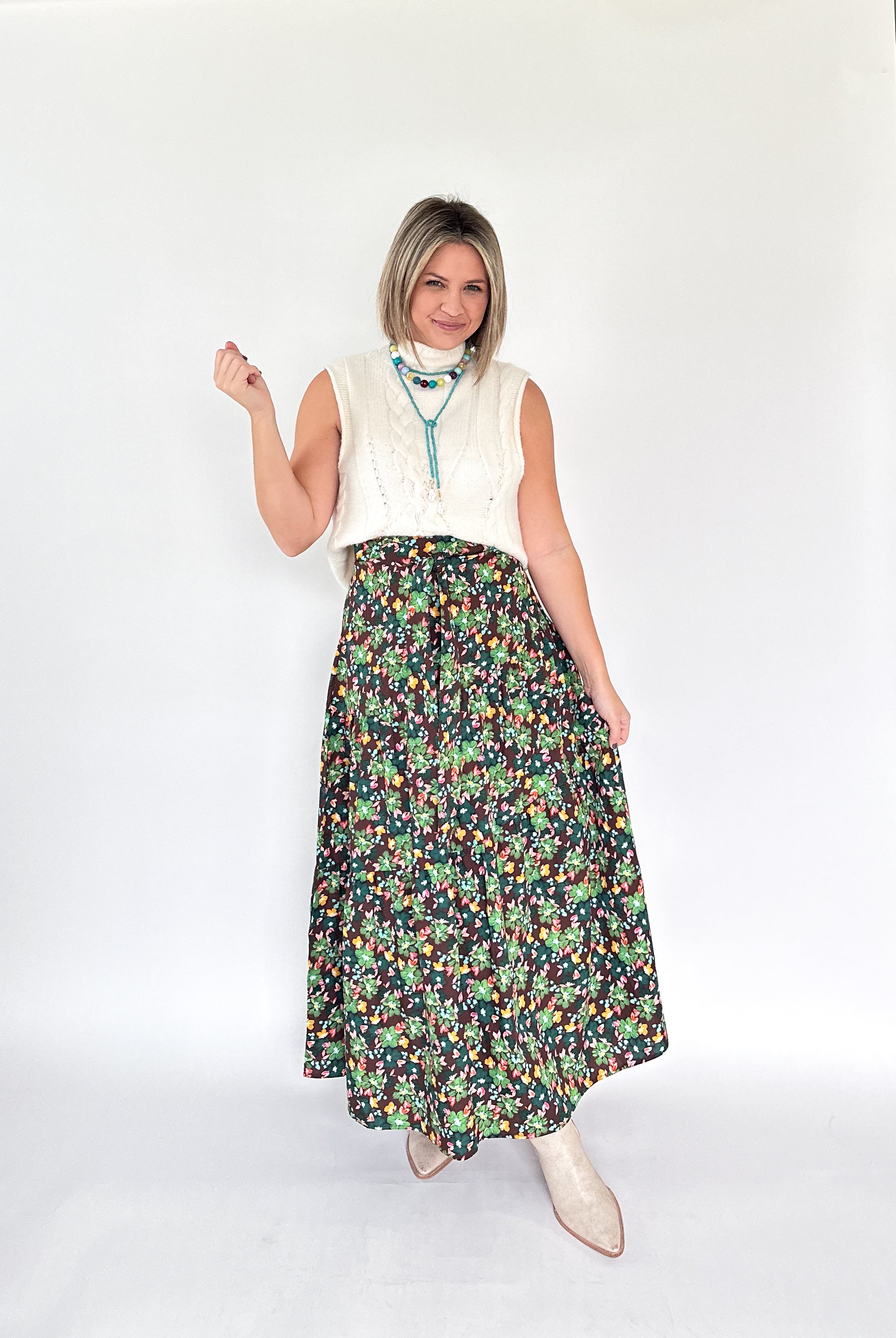 entro cream sleeveless sweater