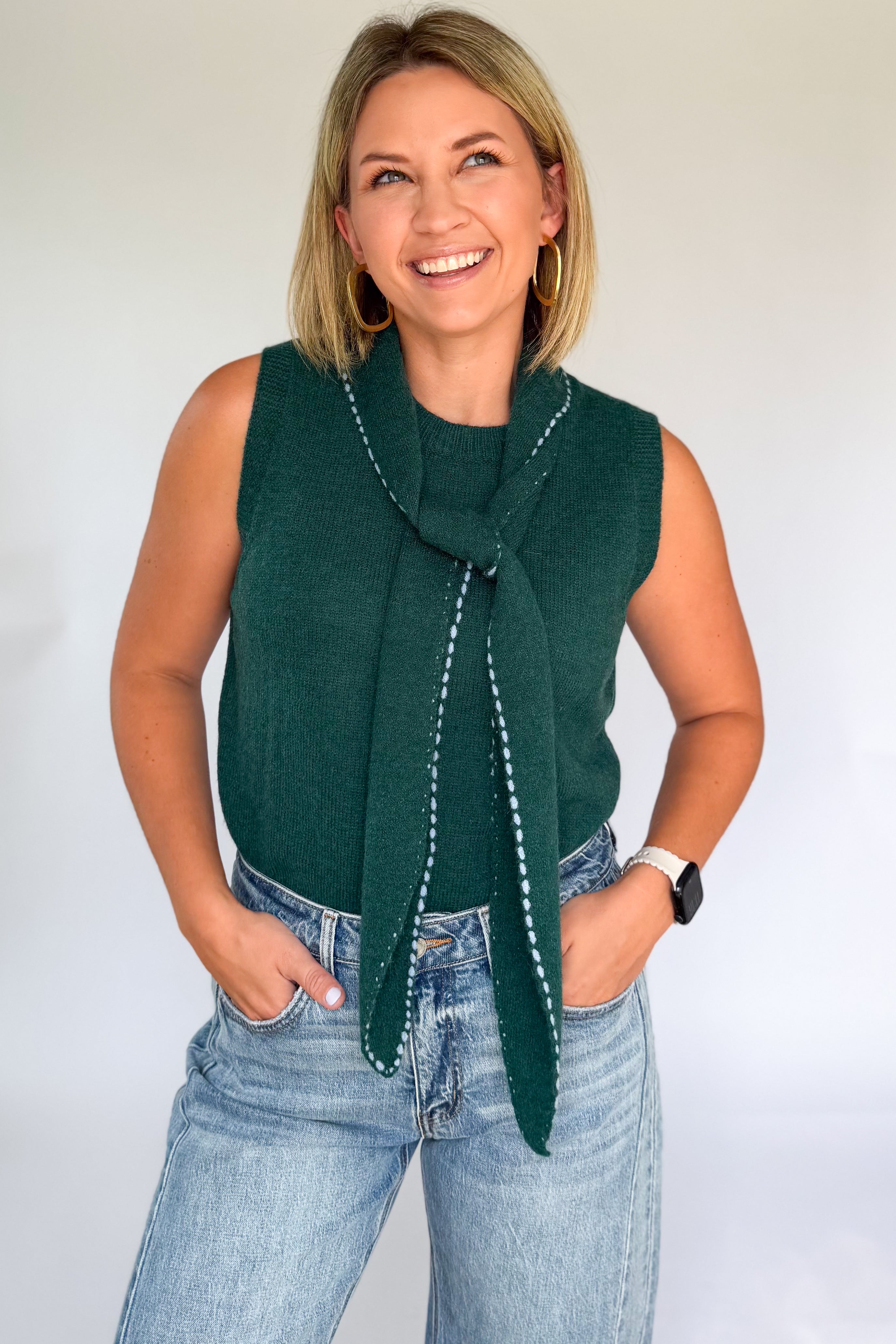 entro green sweater with blue stitch detailing