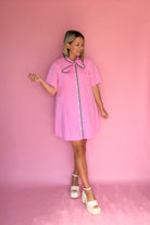 entro pink mini dress with tie around the neck