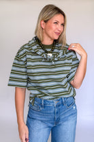 entro green and blue stripe top with tie around the neck